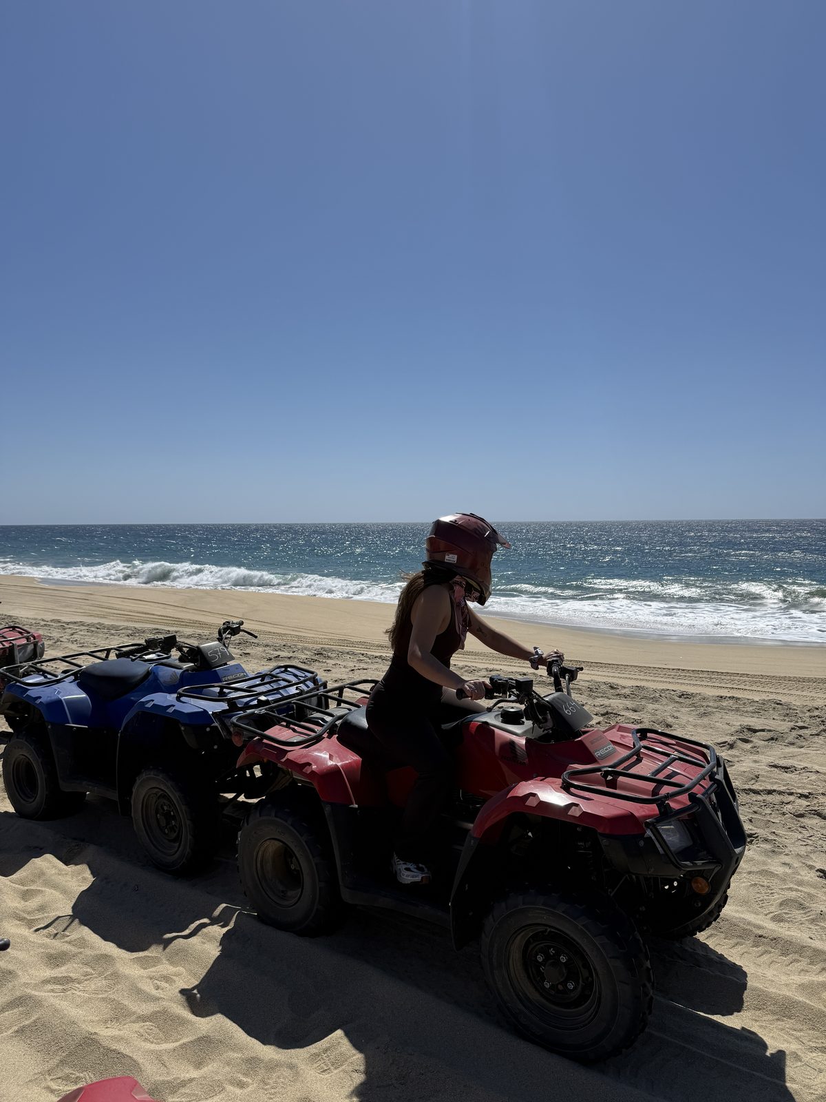 All-Black Outfit for an ATV Ride on the Beach in Cabo