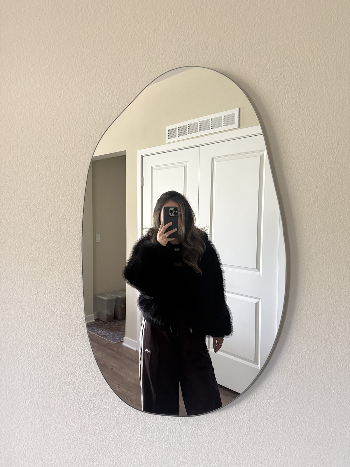 Faux Fur Jacket Styled With Track Pants
